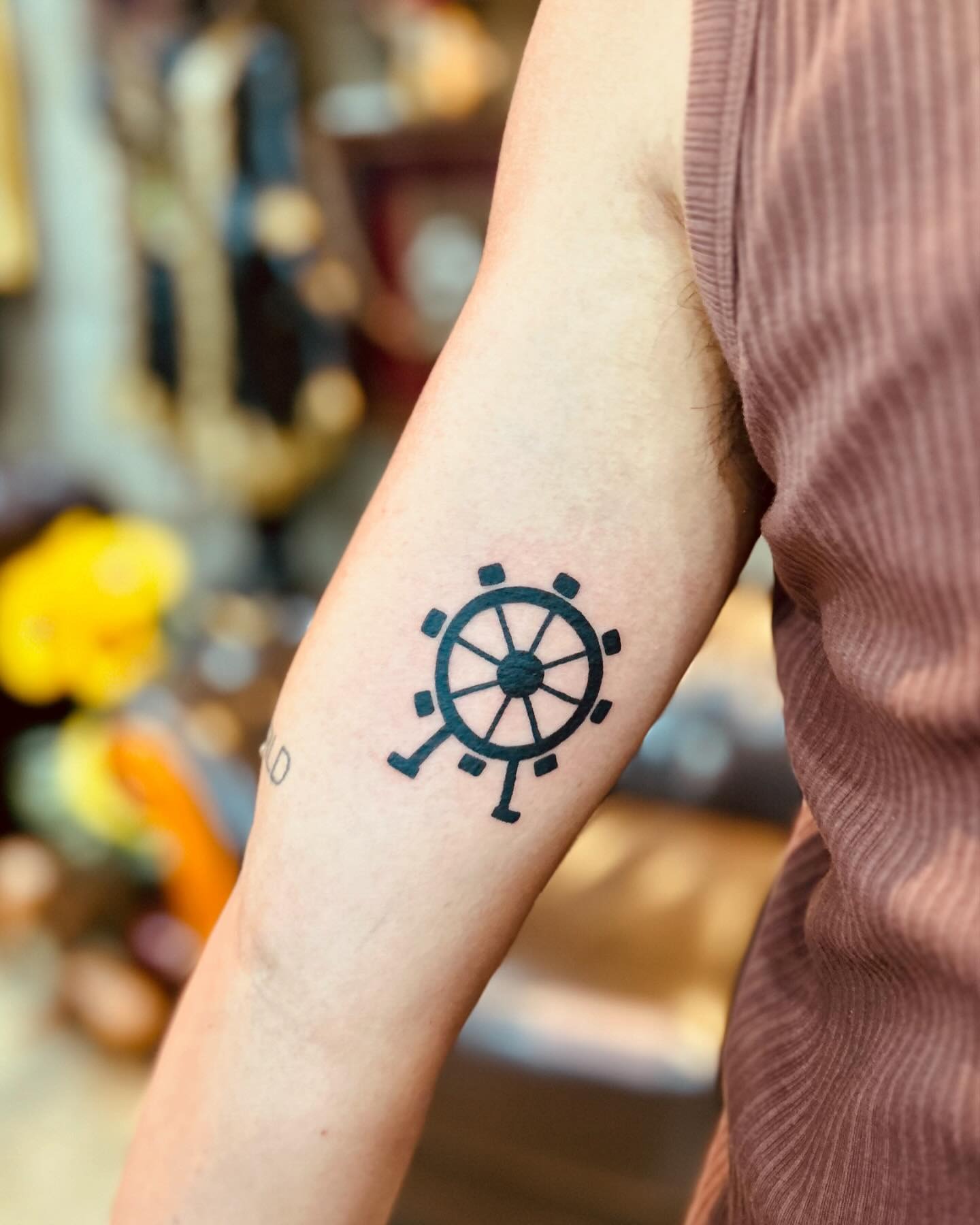 Minimalistic Ferris Wheel Tattoo on Arm Tattoo Design