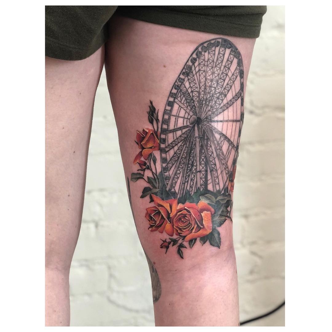 Vibrant ferris wheel tattoo with blooming roses Tattoo Design