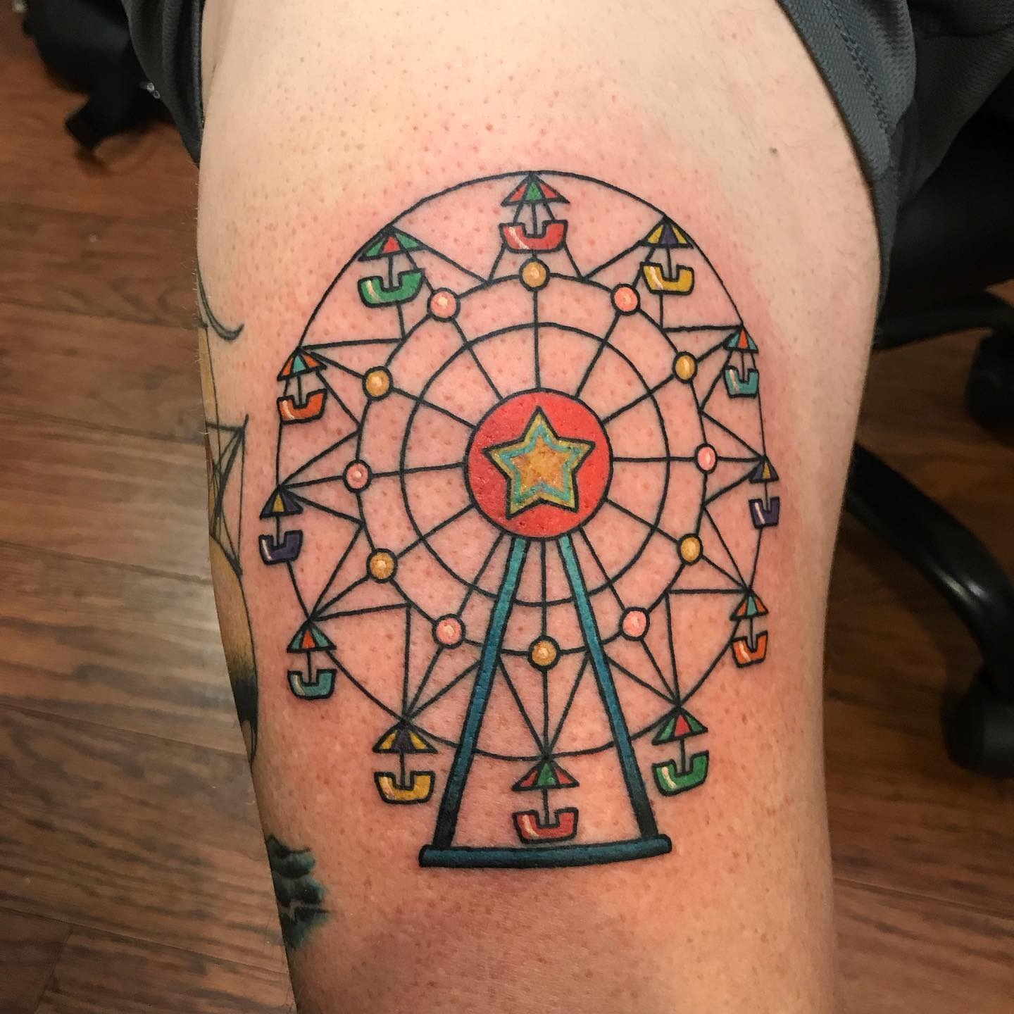 Vibrant Ferris Wheel Tattoo with Star Charm Tattoo Design