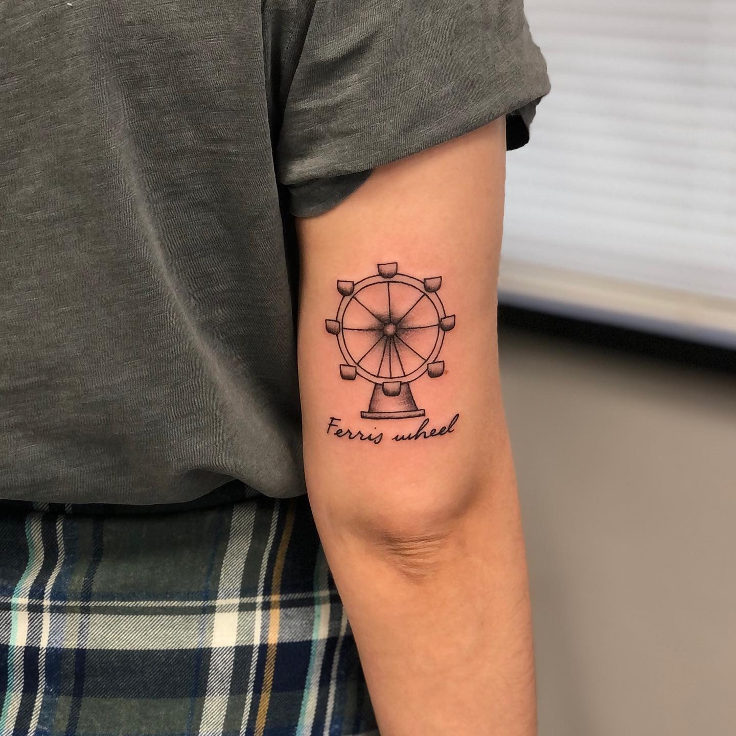 Whimsical Ferris Wheel Tattoo on Arm Tattoo Design