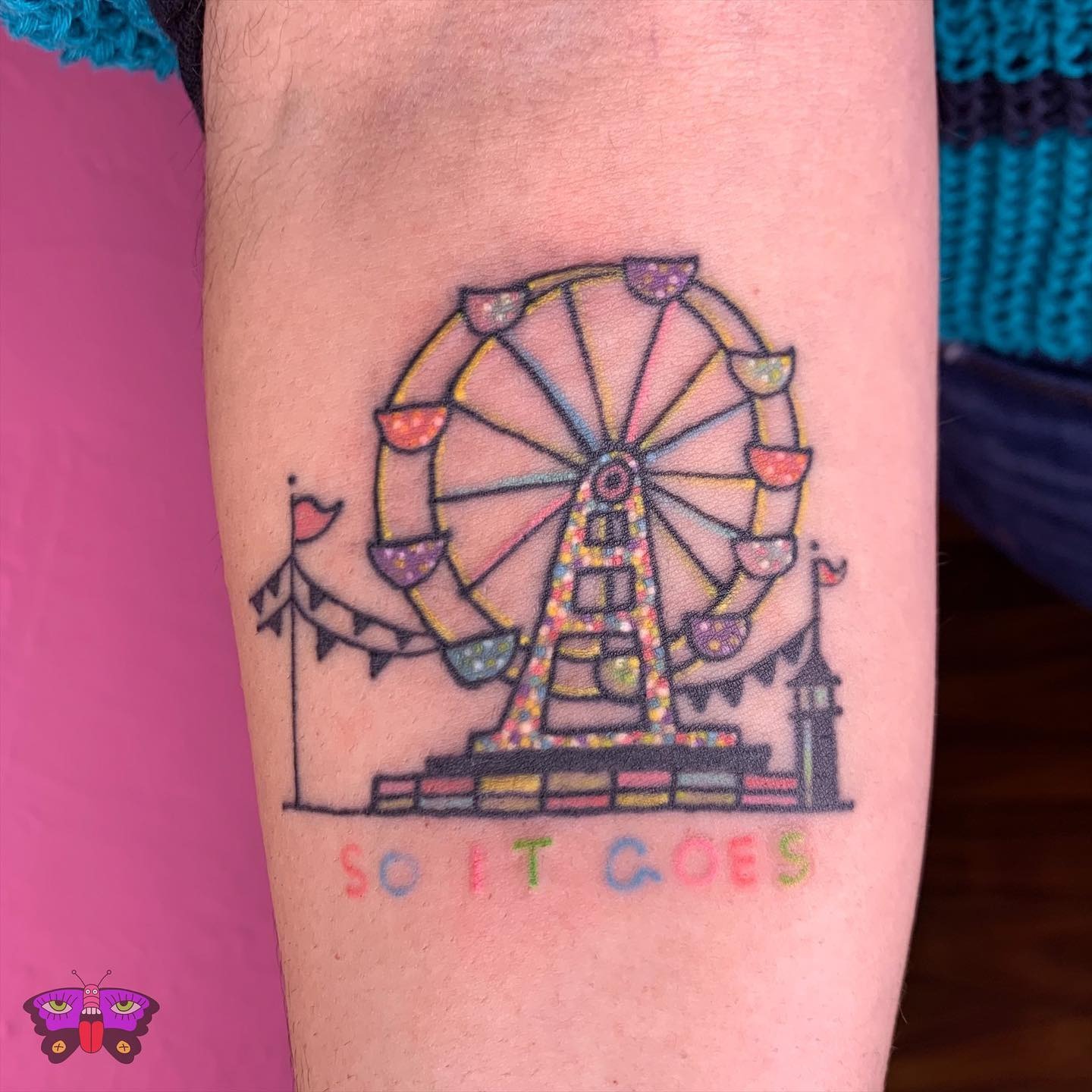 Whimsical Ferris wheel tattoo with bright colors Tattoo Design