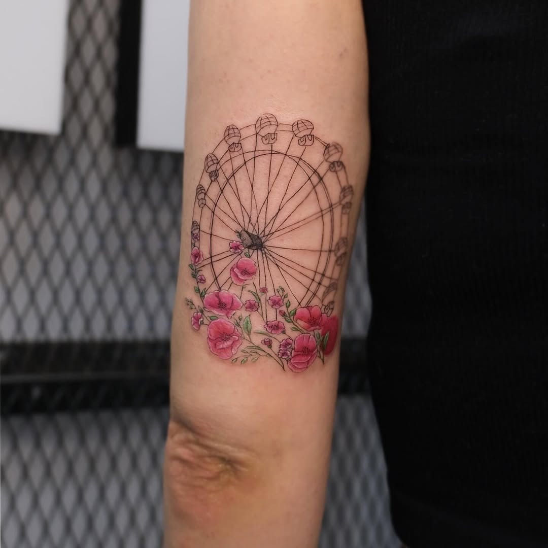 Whimsical Ferris Wheel Tattoo with Floral Accents Tattoo Design