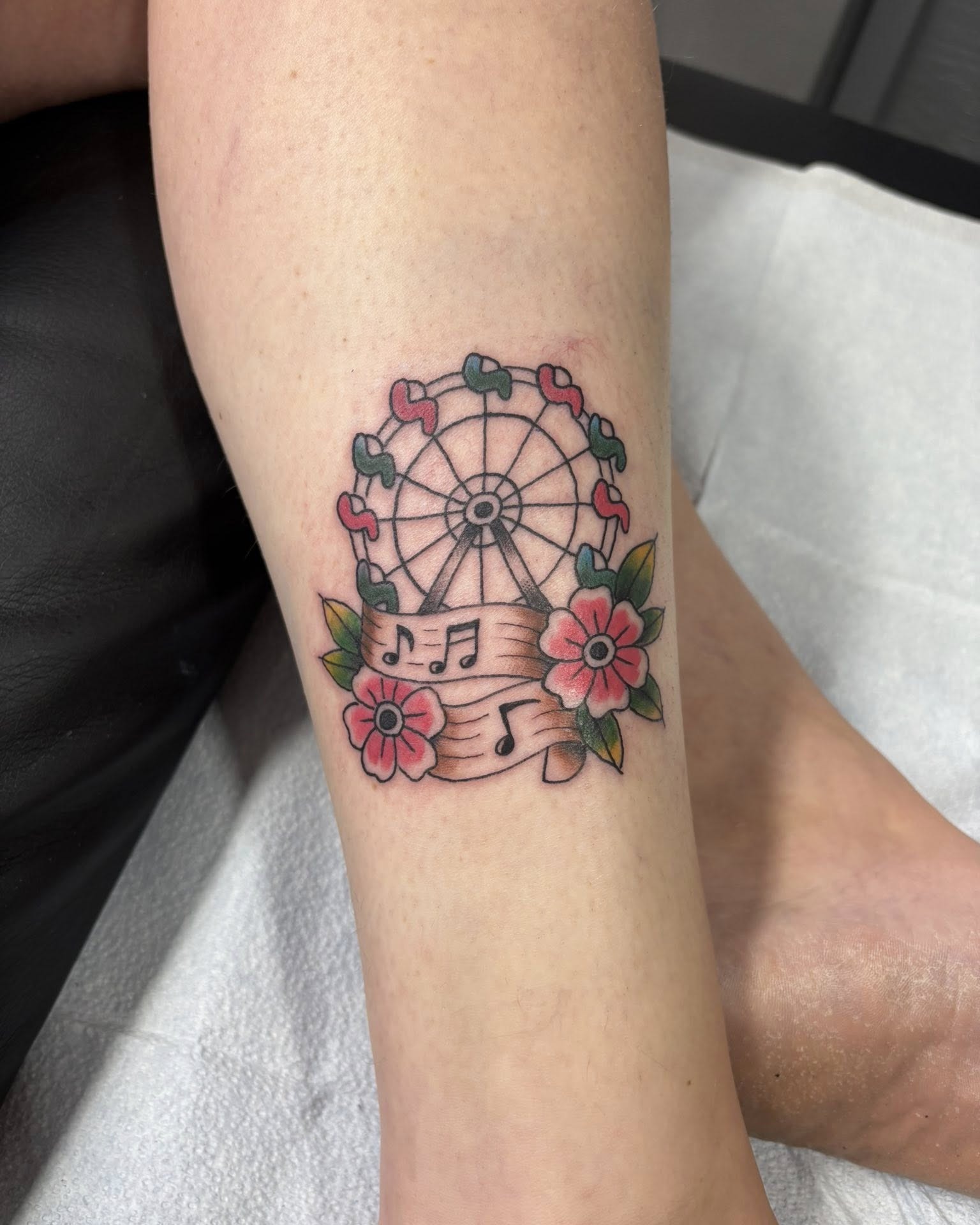 Whimsical Ferris Wheel Tattoo with Floral Details Tattoo Design