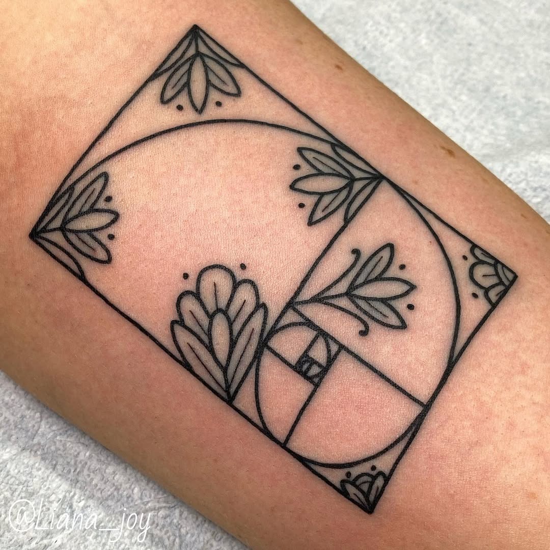 Elegant geometric design with floral elements Tattoo Design
