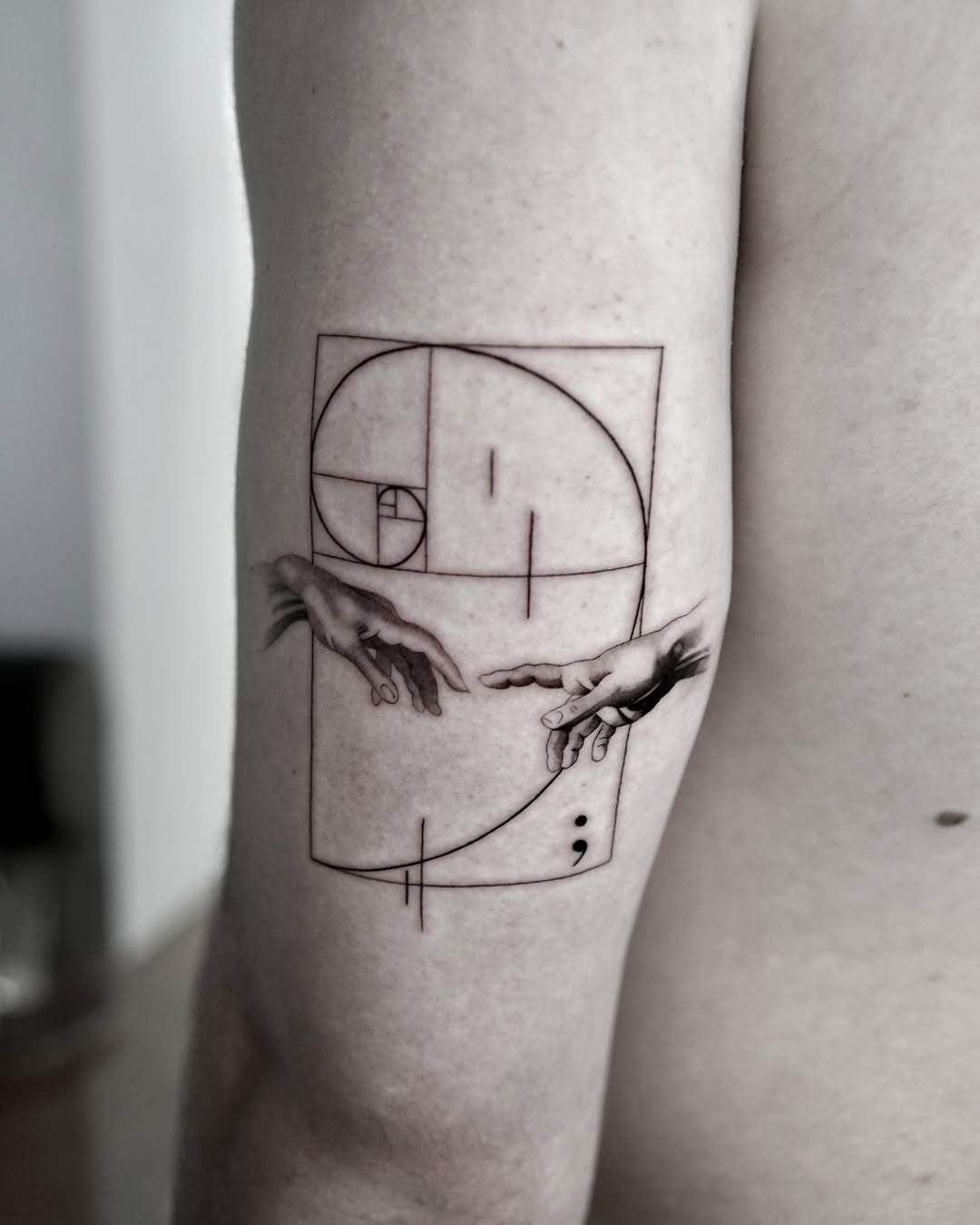 Intersecting hands within Fibonacci patterns Tattoo Design