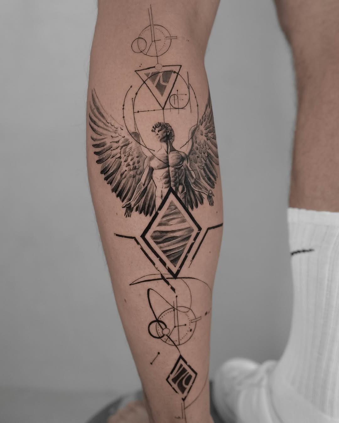 Intricate Fibonacci-inspired tattoo blending geometry and nature. Tattoo Design