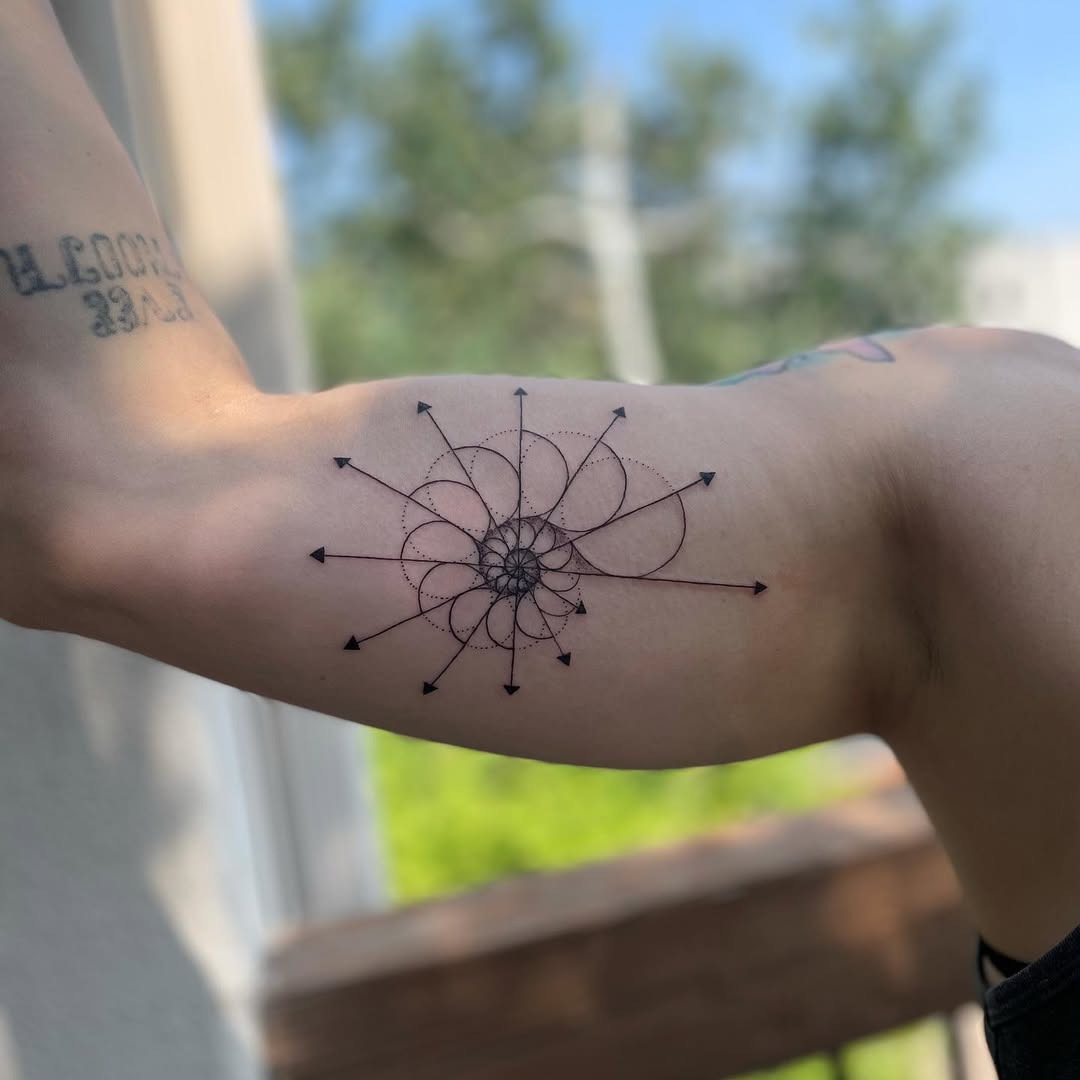 Stylish Fibonacci Spiral Tattoo with Arrows Tattoo Design