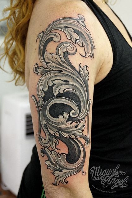 Bold Filigree Arm Design Tattoo Design