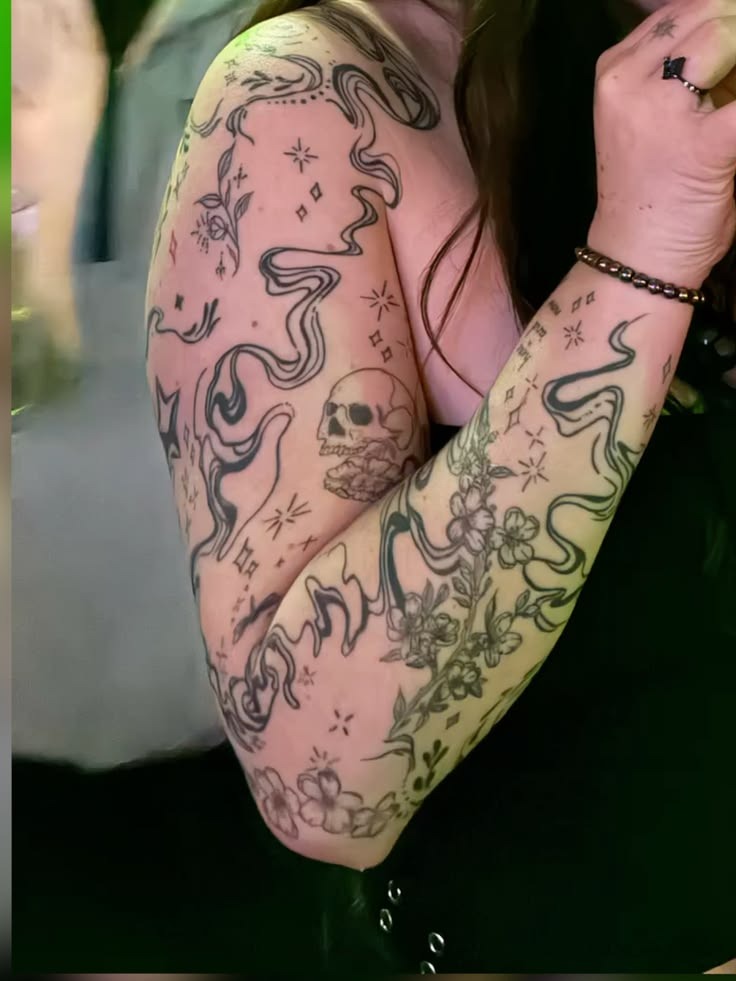 Flowing Ribbon Filler with Tiny Stars and Florals, a tattoo design rendered in clean detailed linework for the sleeve.