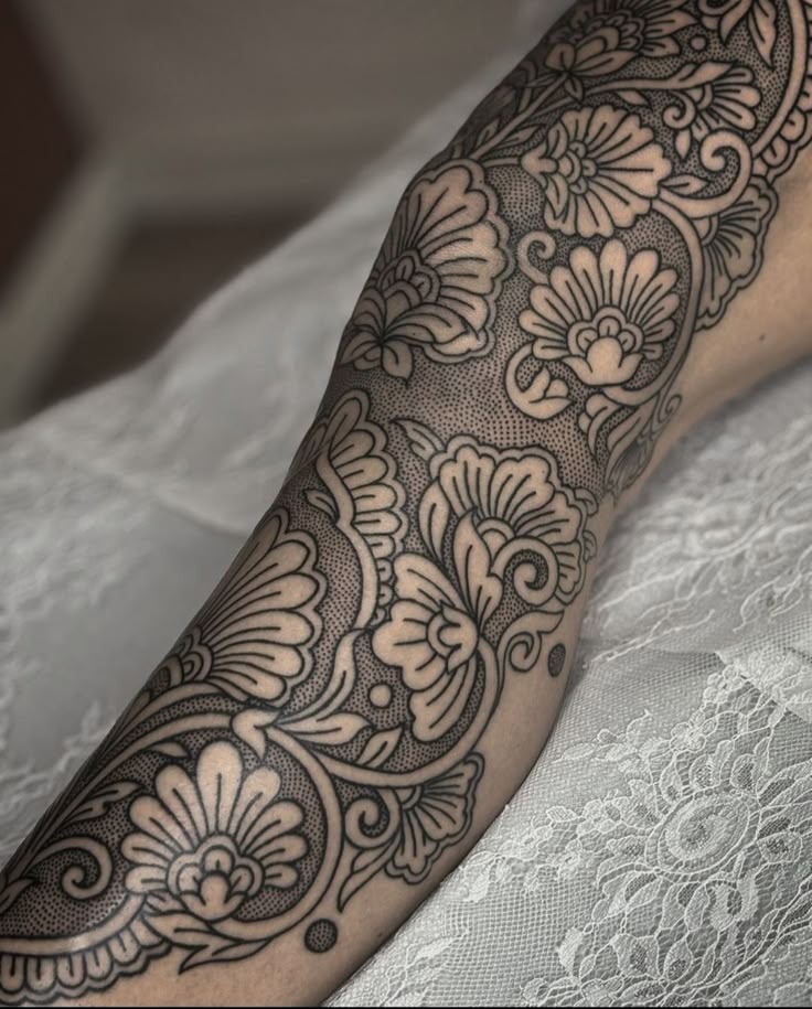 Ornamental Lace-Style Filler with Dotwork Shading, a tattoo design rendered in blackwork for the sleeve.