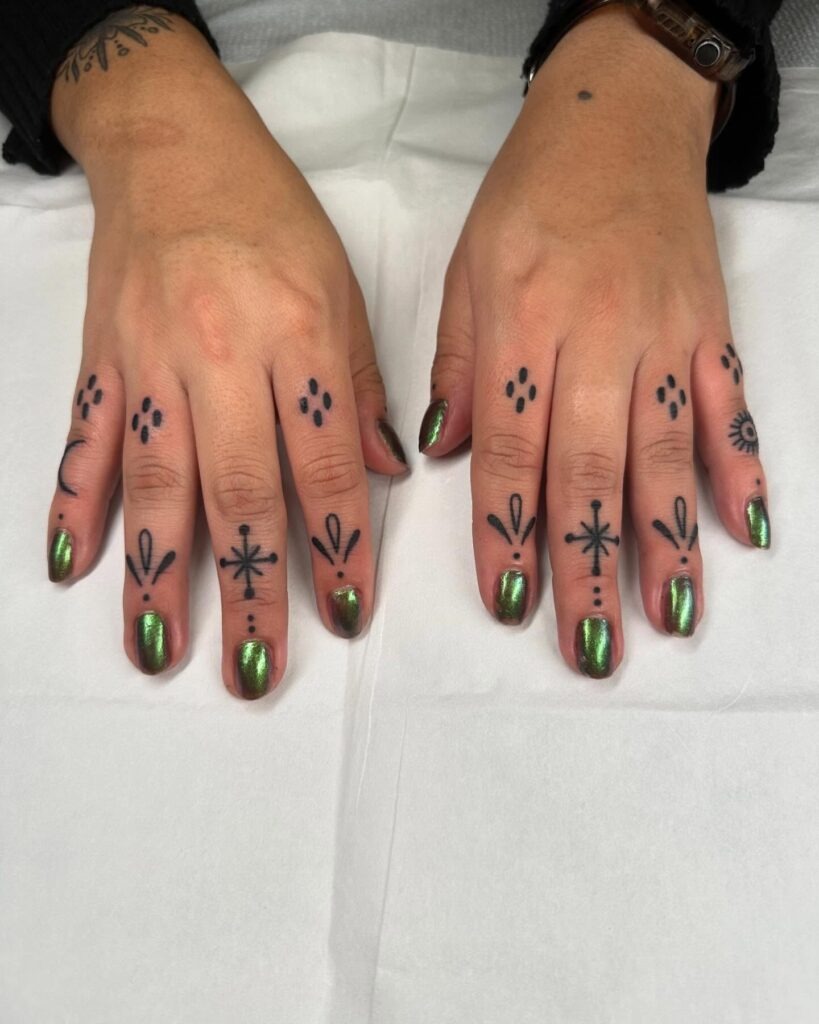 Dark Ornamental Finger and Hand Tattoo Tattoo Design