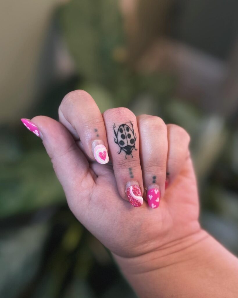 Delicate Butterfly Finger Tattoo Tattoo Design