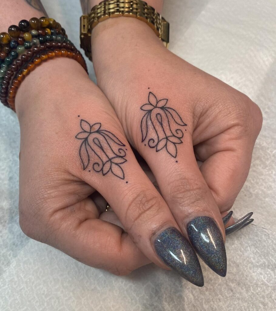 Elegant Ornamental Finger Tattoo Tattoo Design