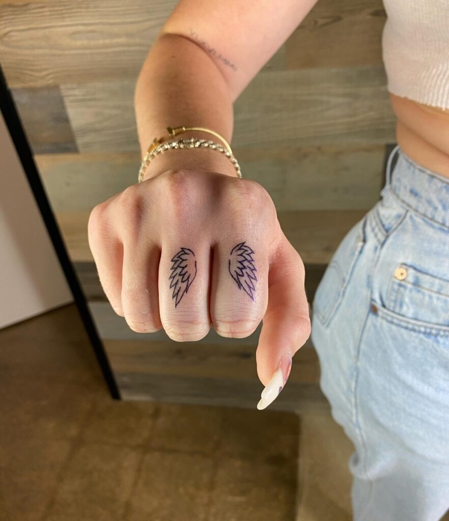 Minimalist Black Heart Finger Tattoo Tattoo Design