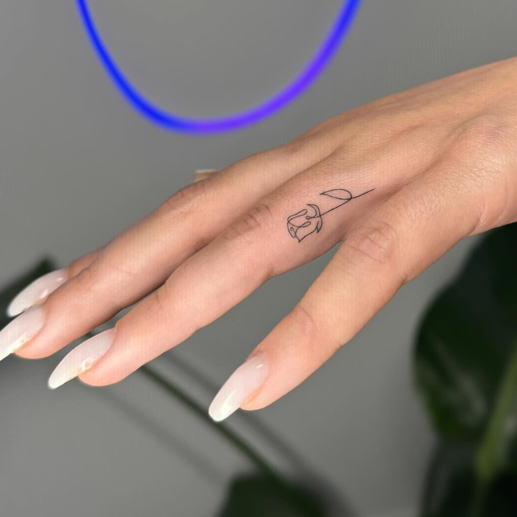 Playful Ladybug Finger Tattoo Tattoo Design