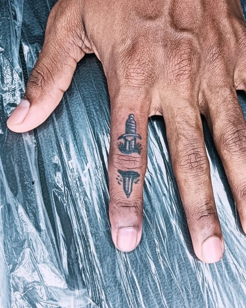 “PROLIFIC” Bold Finger Tattoo Tattoo Design