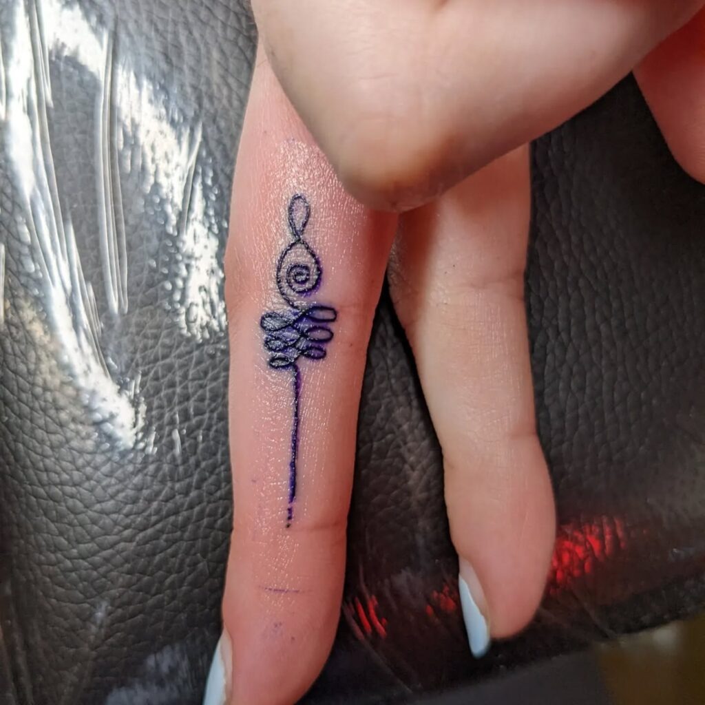 Tiny Minimalist Flower Finger Tattoo Tattoo Design