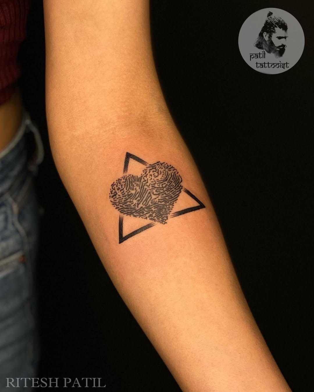 Artistic fingerprint heart within geometric shapes Tattoo Design