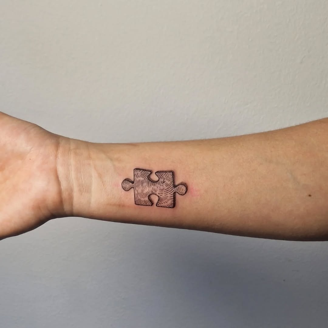 Intricate fingerprint puzzle piece tattoo design Tattoo Design