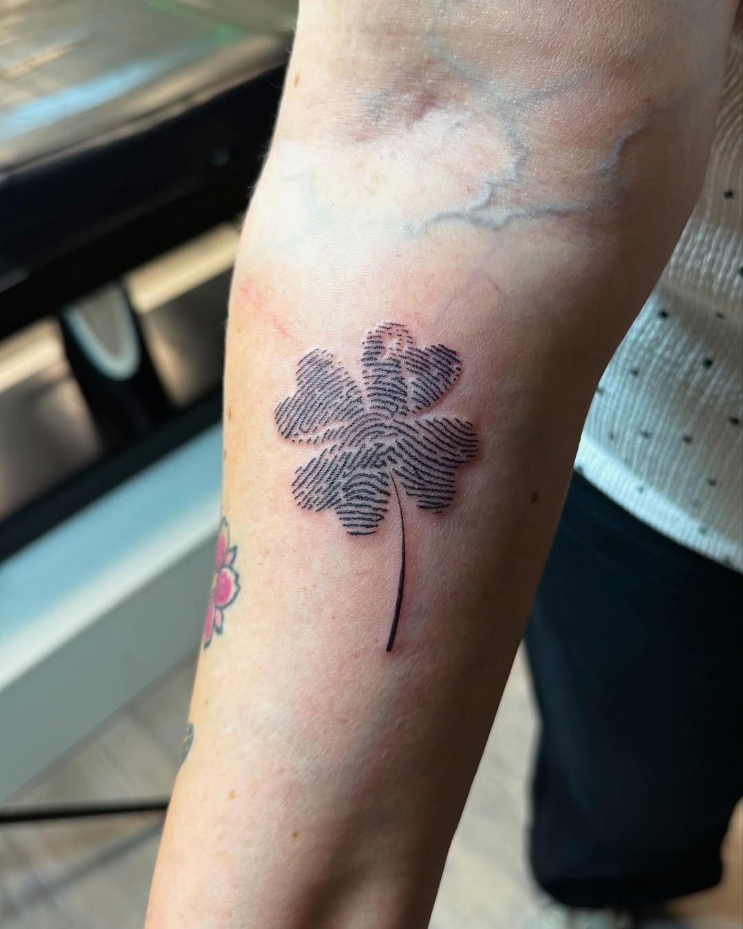 Unique clover design with fingerprint artistry Tattoo Design