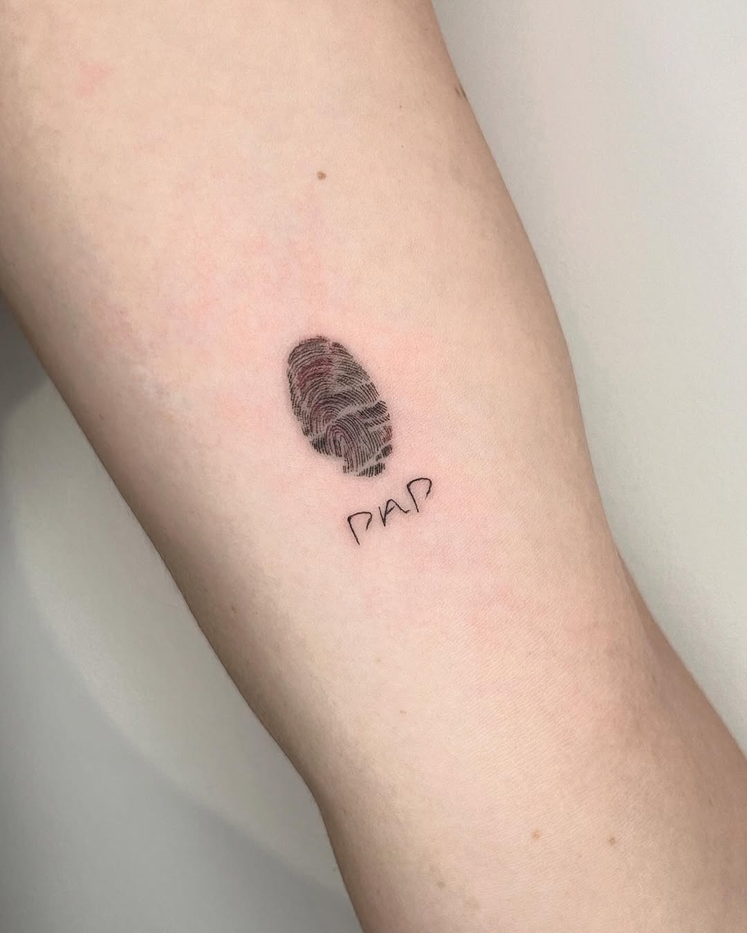 Unique fingerprint tattoo showcasing individuality Tattoo Design