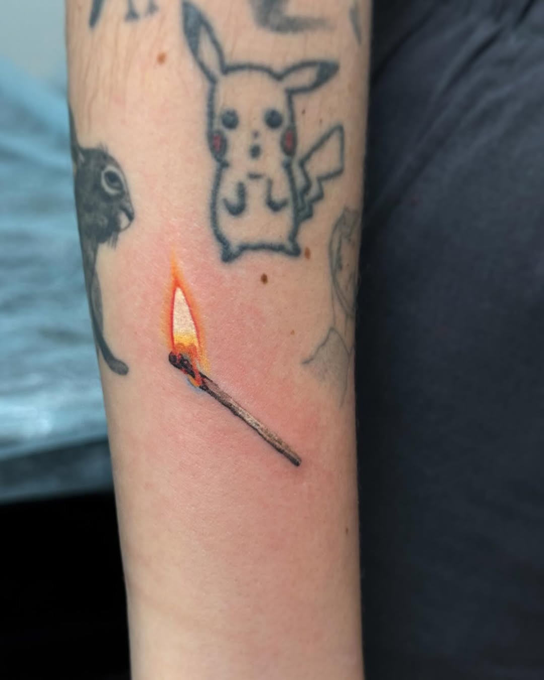 A vibrant match tattoo igniting creativity. Tattoo Design