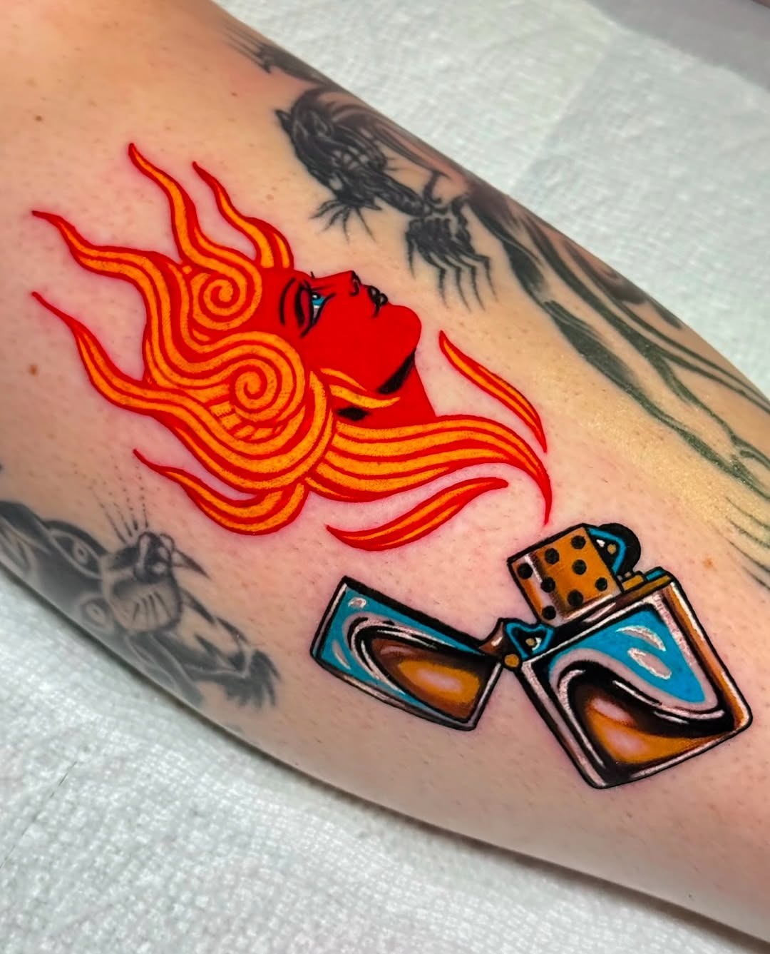 Bold fire and striking lighter tattoo design Tattoo Design
