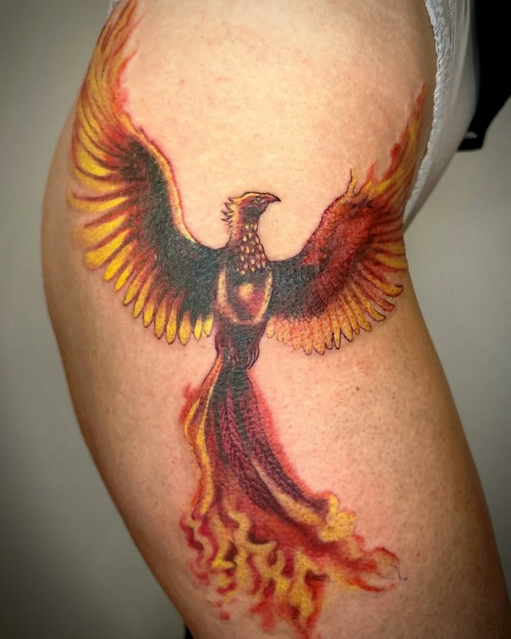 Colorful Phoenix Tattoo Symbolizing Rebirth Tattoo Design