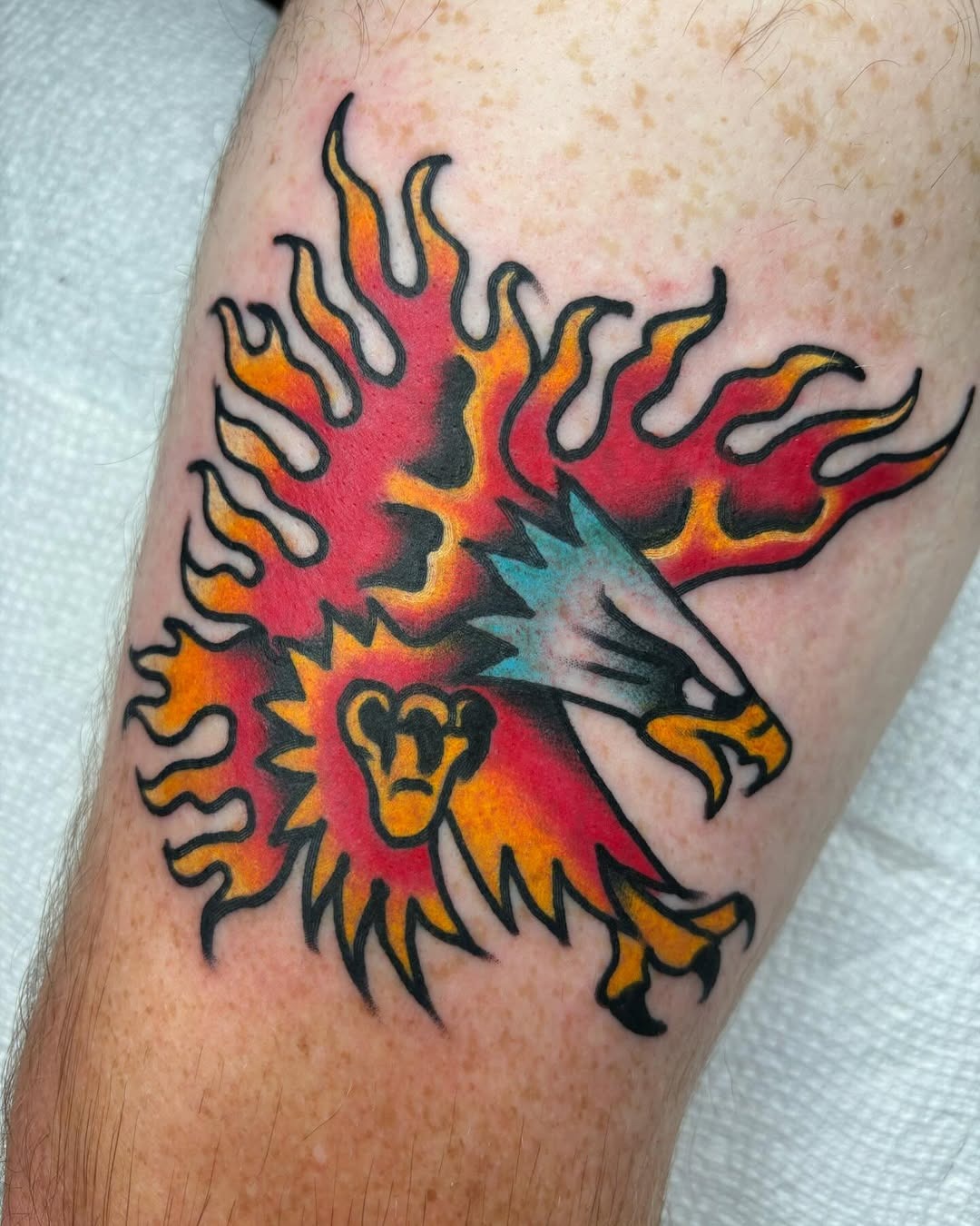 Dynamic flaming lion tattoo design with vibrant colors Tattoo Design
