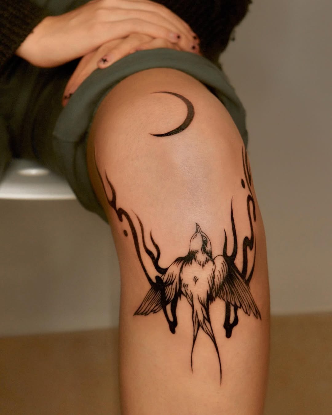 Elegant fire-themed bird tattoo design Tattoo Design