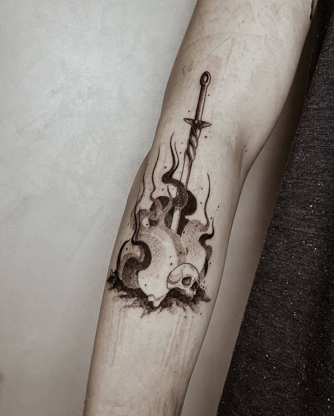 Intricate fire-themed tattoo with sword and skull Tattoo Design