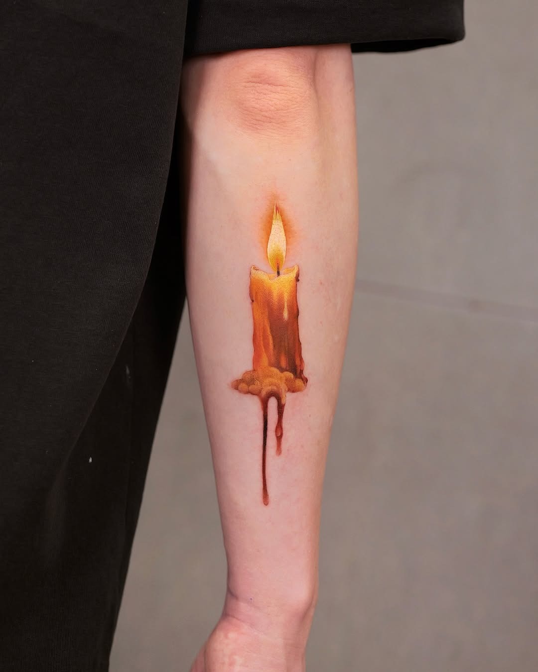 Realistic candle tattoo radiating warmth and glow Tattoo Design