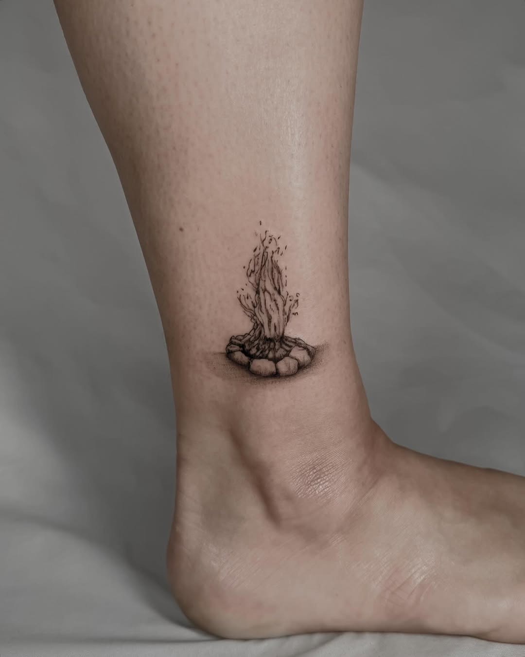 Realistic fire tattoo with earthy vibes Tattoo Design