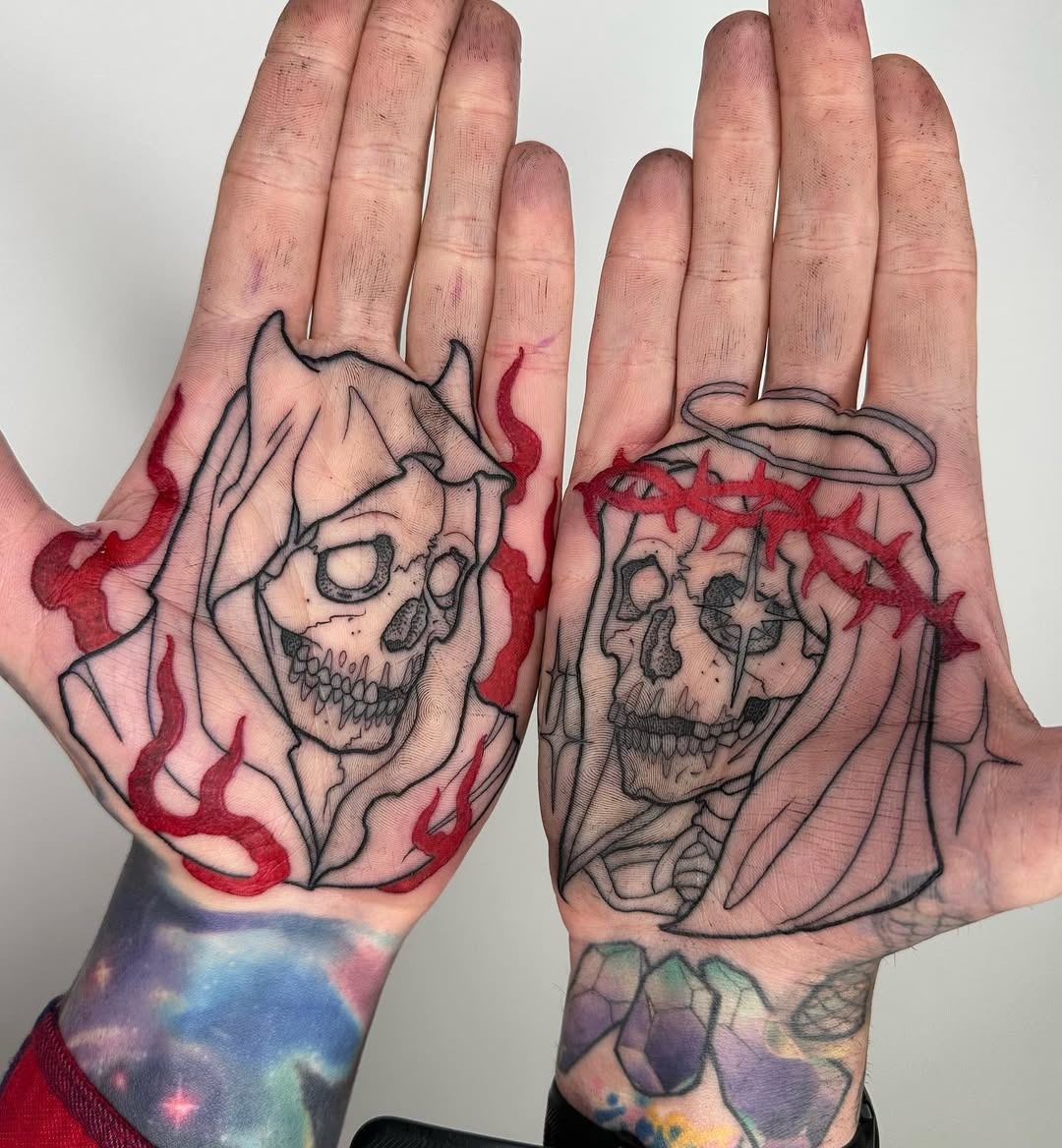 Striking fire-themed skull hand tattoos Tattoo Design