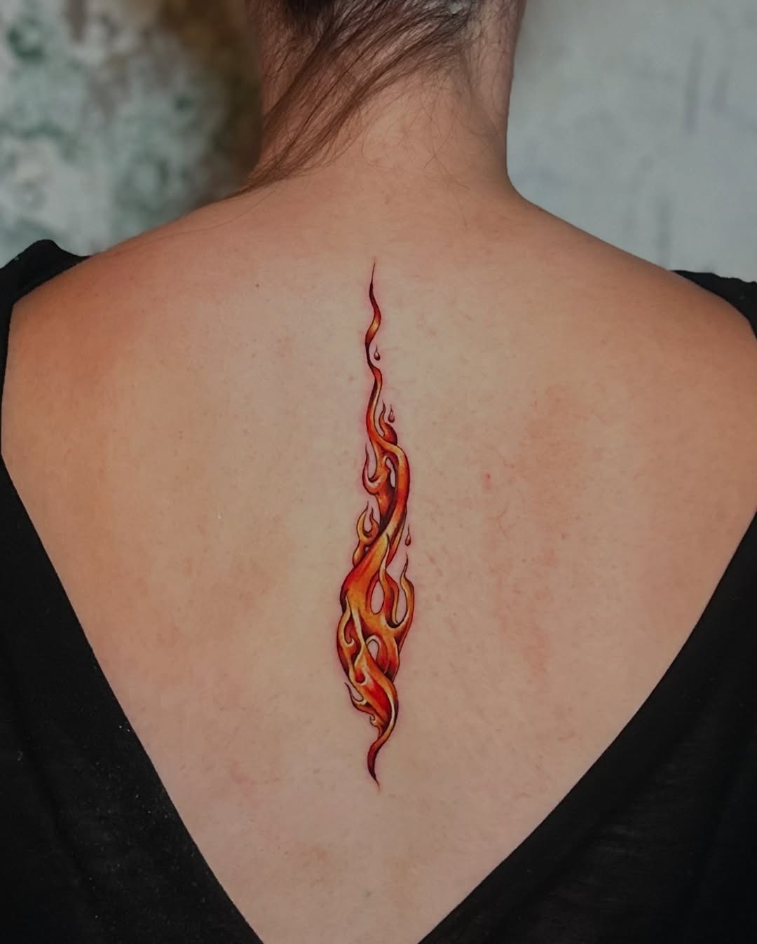 Stylish Vertical Flame Tattoo on Back Tattoo Design