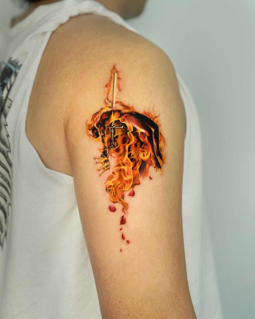 Vibrant fire and sword tattoo design Tattoo Design
