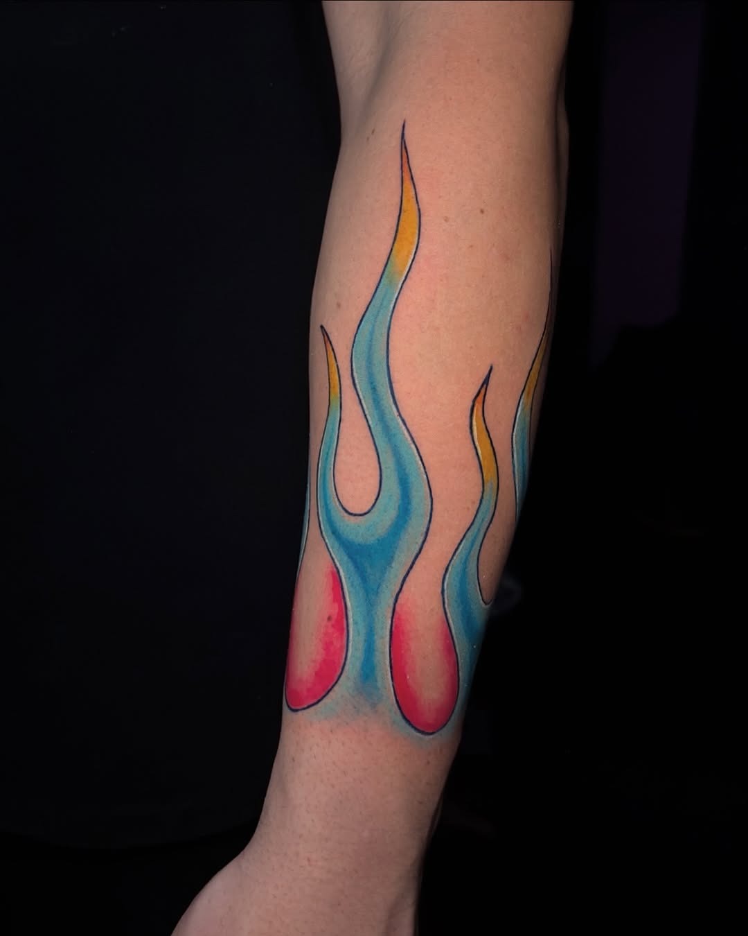 Vibrant flames showcasing colorful tattoo artistry Tattoo Design