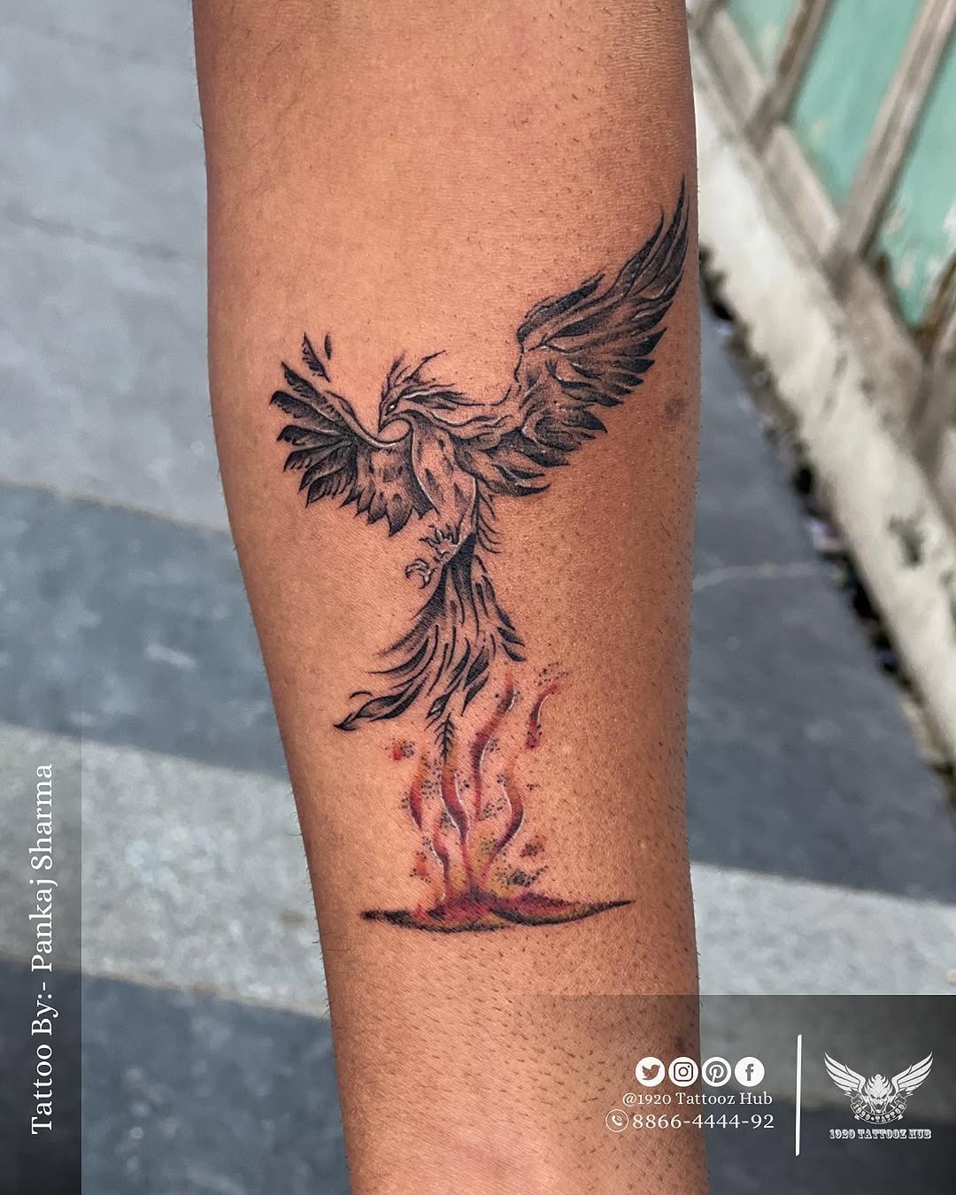 Vibrant phoenix rising from fiery embers Tattoo Design