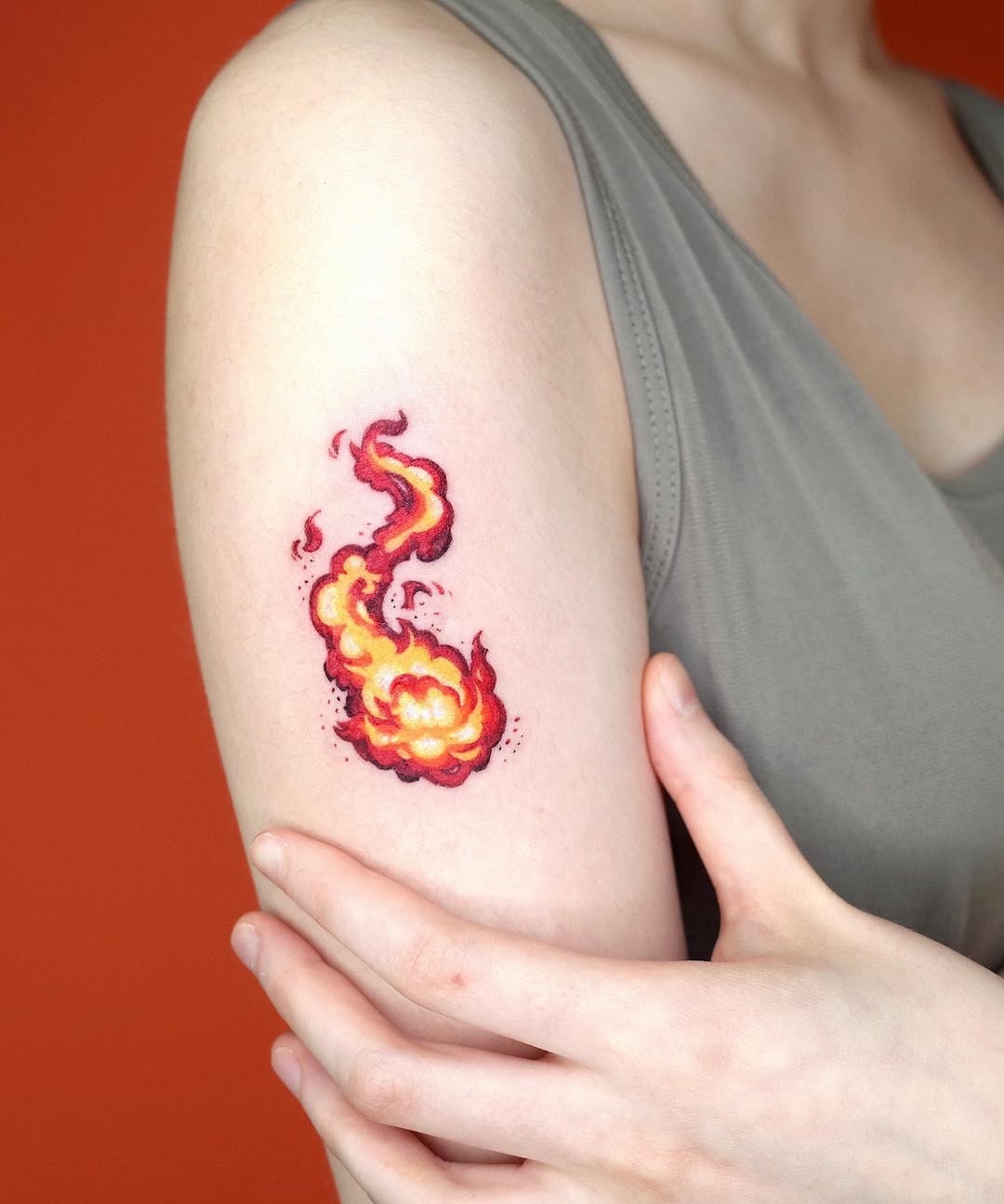 Vivid fire tattoo showcasing swirling flames Tattoo Design