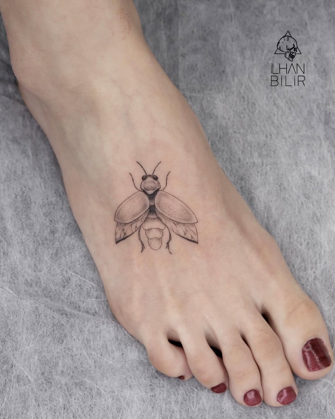This stunning firefly tattoo captures the delicate beauty of nature.