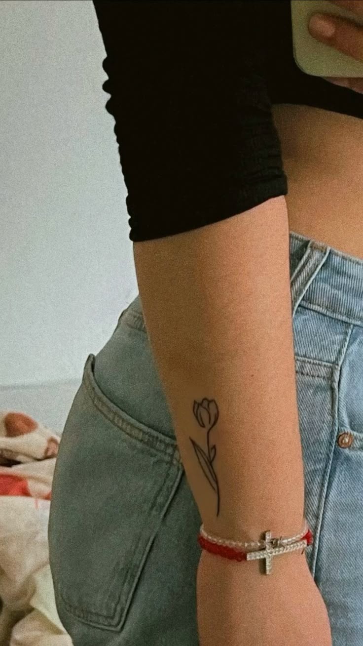 Minimalist Tulip on the Inner Arm Tattoo Design