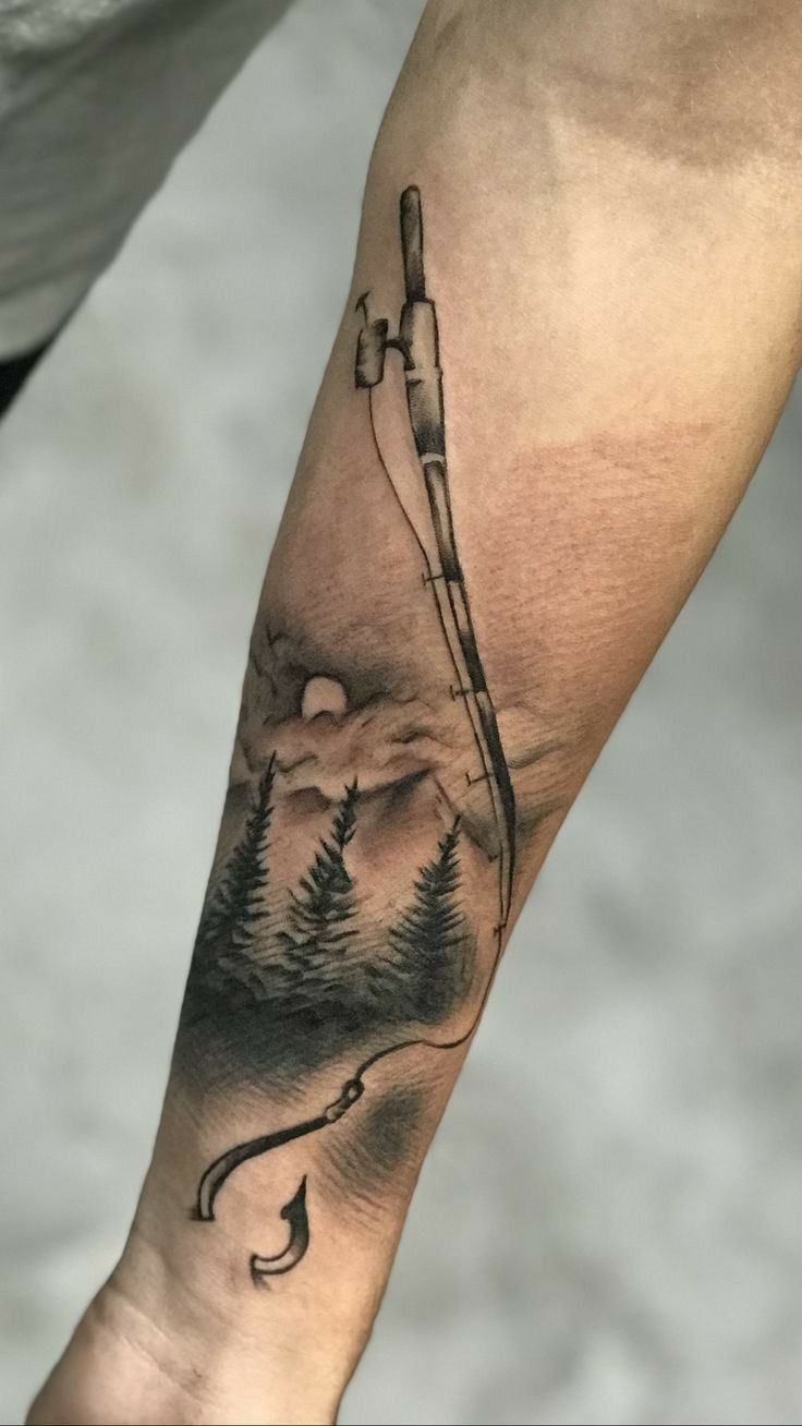 Scenic Fishing Rod Landscape Tattoo, a tattoo design rendered in clean detailed linework for the arm.