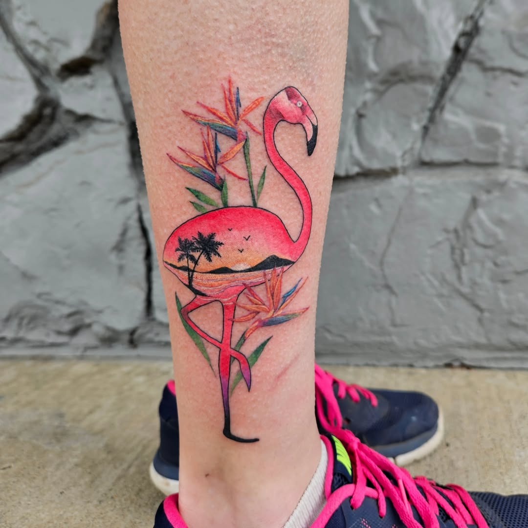 Bright flamingo tattoo with tropical floral elements Tattoo Design