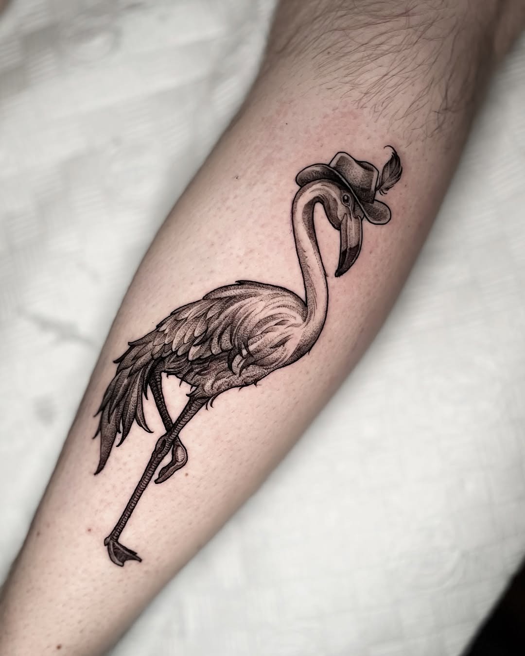Chic flamingo tattoo with a fashionable twist Tattoo Design