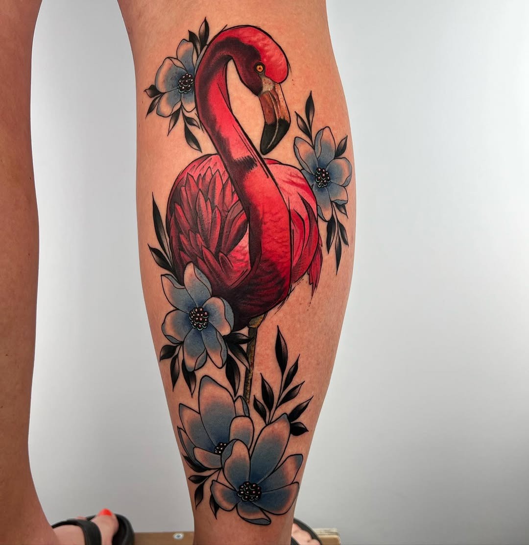 Stunning flamingo tattoo with floral accents Tattoo Design