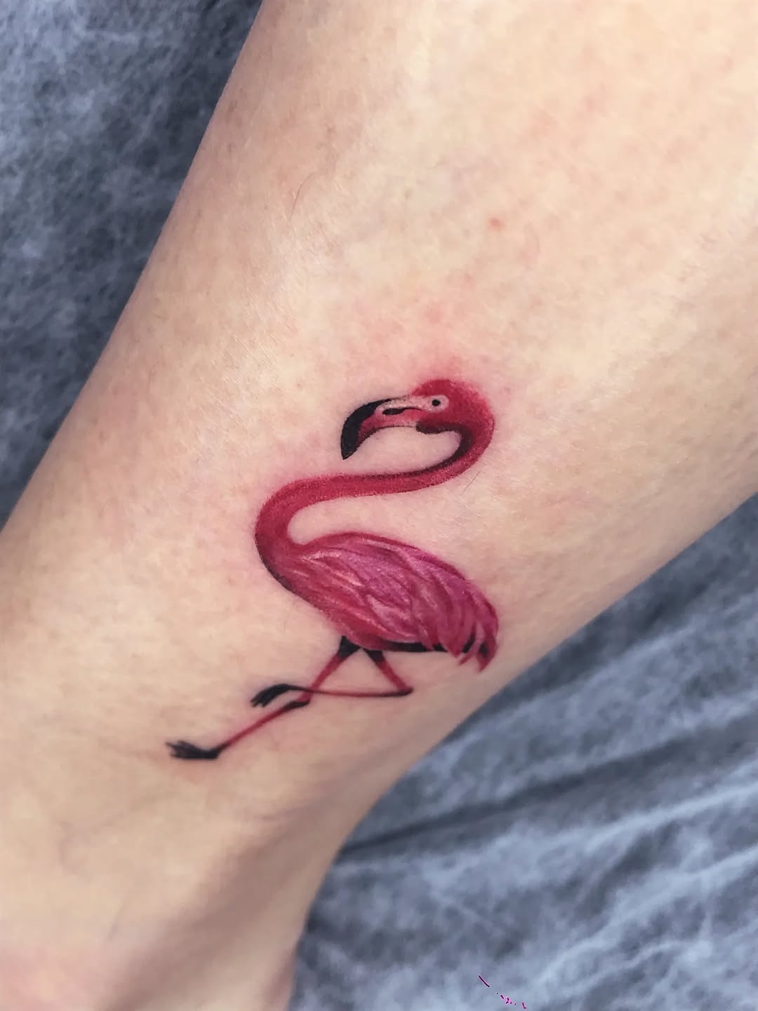 Stylish flamingo tattoo with vibrant colors Tattoo Design