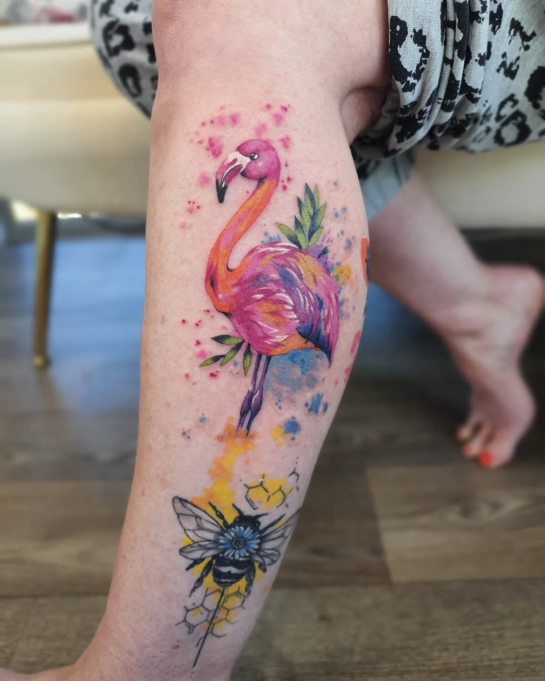 Vibrant Flamingo Tattoo with Floral Accents Tattoo Design