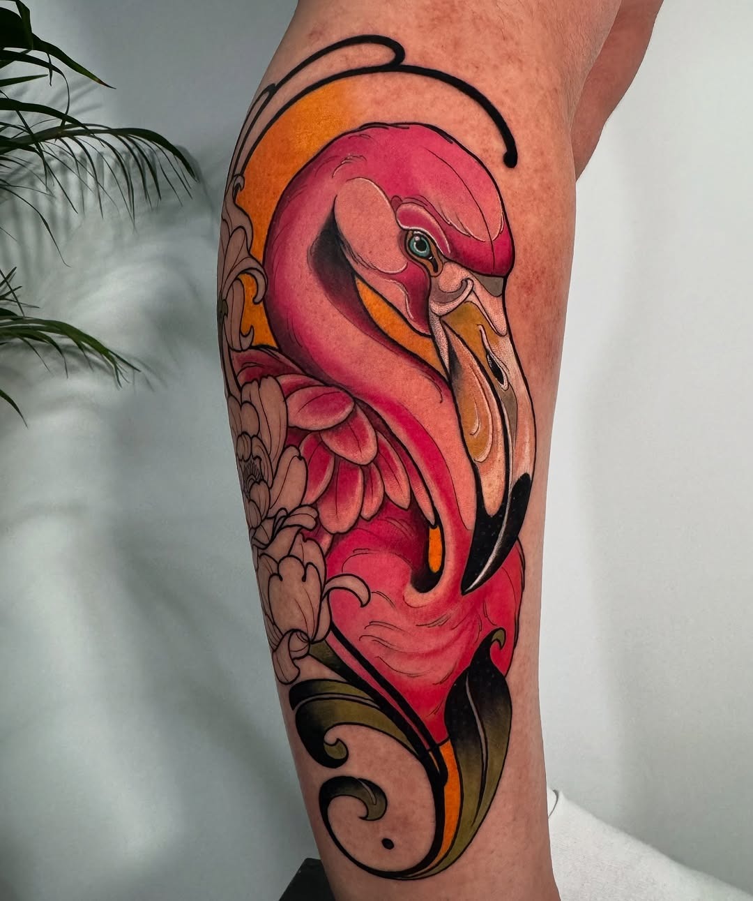 Vibrant flamingo tattoo with floral elements Tattoo Design