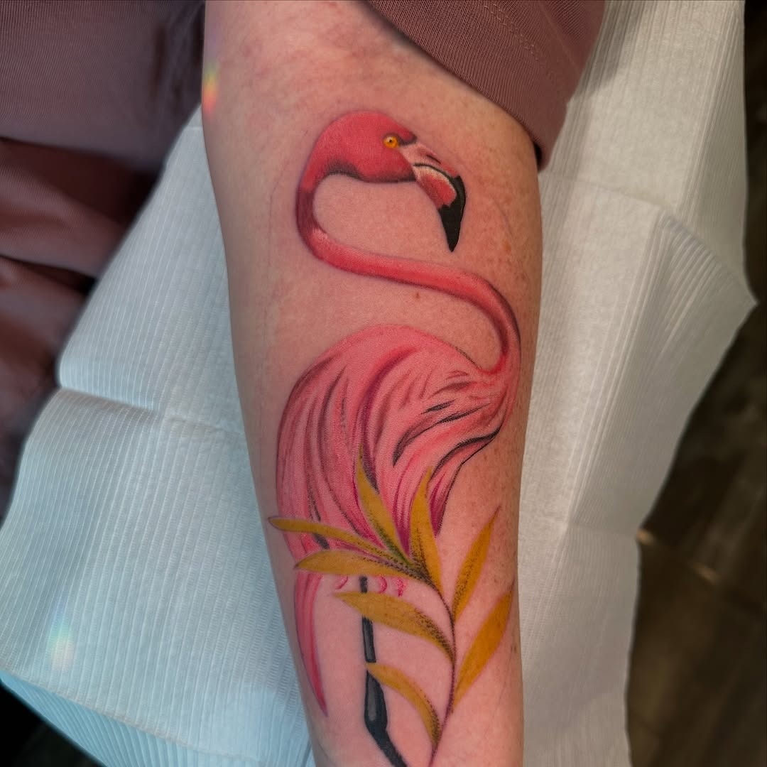 Vibrant Flamingo Tattoo with Lush Greens Tattoo Design