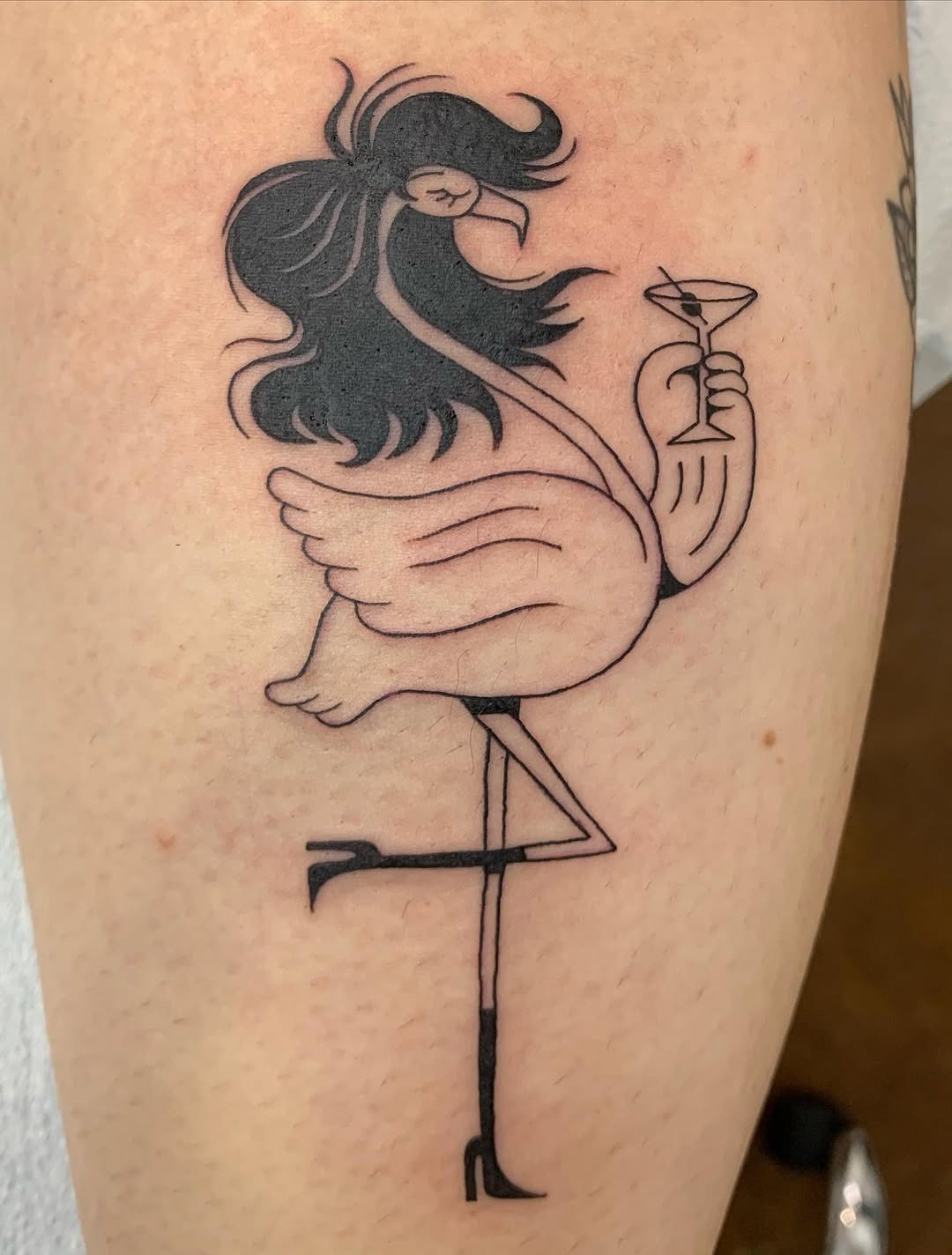 Whimsical flamingo tattoo with a chic twist Tattoo Design